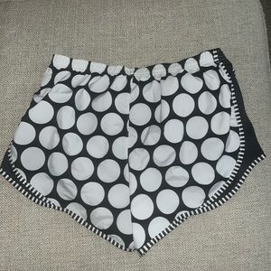 Varsity gym shorts, size medium, black and white, dot patterned